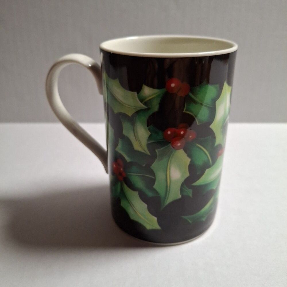 Dunoon stoneware mug featuring the "Holly" design by Caroline Bessey